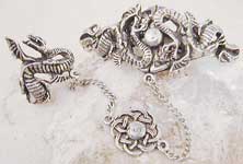 The Medieval Celtic dragon slave bracelet is crafted of lead-free pewter, adjustable - one size fits all.