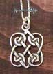 Sterling Silver Celtic Love Knot. Two Hearts entwined in silver celtic knots. 5/8