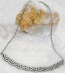 The necklace is made of lead free pewter. The Celtic necklace is 5-1/2