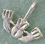 Claddagh charm pendant. The tradition of wearing charms dates back to medieval times. Objects were frequently worn from a cord or chain about the neck so they would not be lost. 3/4