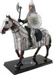 Attired for battle, our Norman knight figurine upon his mighty steed awaits the call for battle. Beautifully crafted in resin and individually hand detailed in spectacular vibrant and metallic colors. 10-1/2