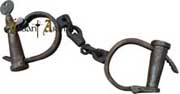 These functional replica medieval handcuffs with key are darkened and weathered to replicate the originals in use during the Middle Ages.