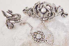 The Medieval Celtic dragon slave bracelet is crafted of lead-free pewter, adjustable - one size fits all.