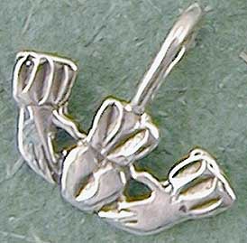 Claddagh charm pendant. The tradition of wearing charms dates back to medieval times. Objects were frequently worn from a cord or chain about the neck so they would not be lost. 3/4