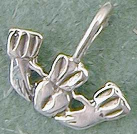 Claddagh charm pendant. The tradition of wearing charms dates back to medieval times. Objects were frequently worn from a cord or chain about the neck so they would not be lost. 3/4"W.