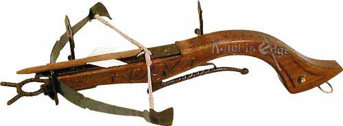 Circa 1644. This unique medieval pistol crossbow of long ago has been beautifully reproduced in Italy and is a fascinating decorative replica, with moving parts. This medieval crossbows size and shape appear much like a pistol.