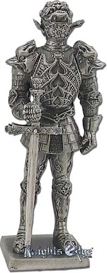 This Italian medieval knight miniature figurine with sword is crafted from pewter. This knight figure adds the perfect decorating touch to your castle decor! Each exquisitely detailed knight stands with weapon. The Italian  knight with sword pewter figurine stands from 4-1/4" tall.